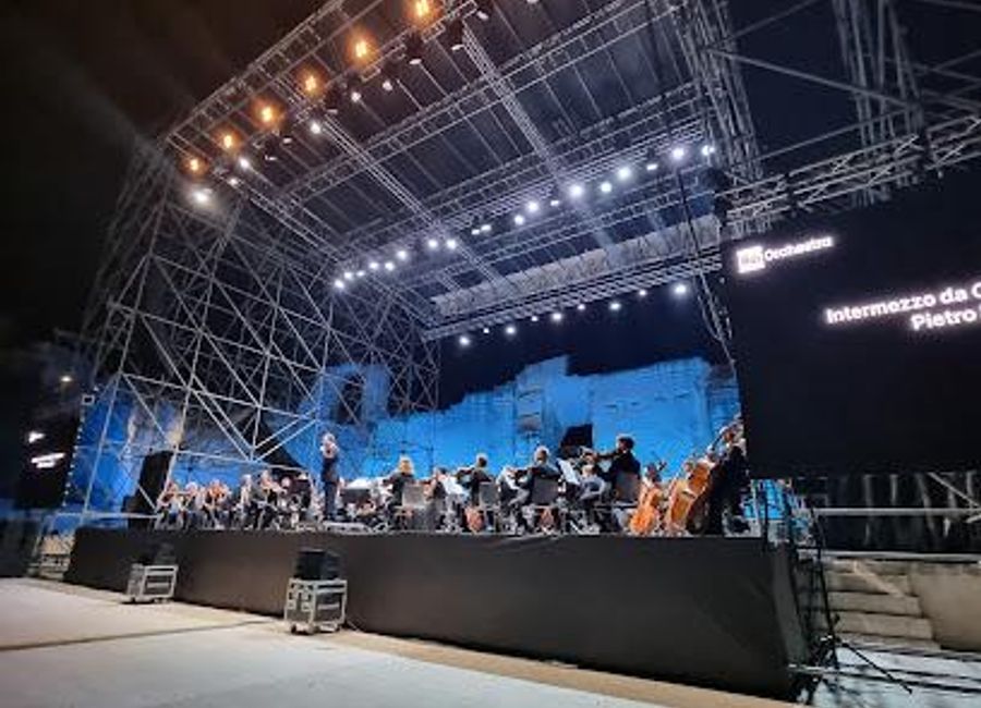 Discover the enchanting Cava Del Sole in Matera, a concert hall carved from rock offering unforgettable music experiences surrounded by stunning landscapes.