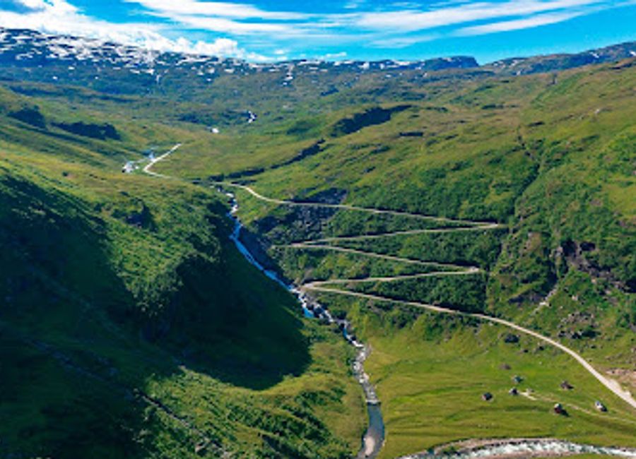 Experience the breathtaking Hólesvingane Waterfalls in Vik i Sogn, Norway – a natural wonder surrounded by stunning landscapes and scenic beauty.