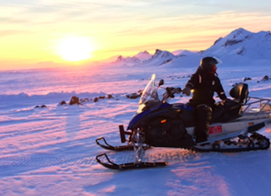 Discover the thrill of snowmobiling across Langjokull Glacier, an unforgettable adventure in Iceland's stunning winter landscapes.