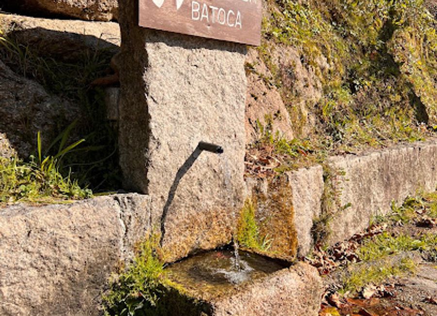 Discover the serene beauty of Fonte da Batoca in Vilar da Veiga, a tranquil natural spring perfect for relaxation and outdoor adventures.
