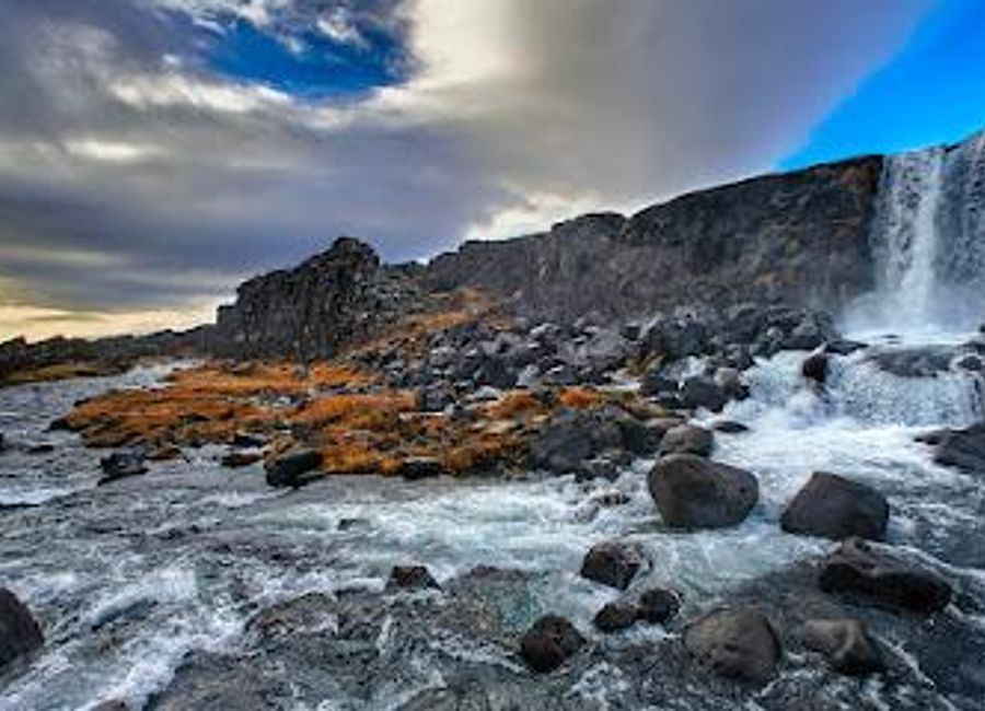 Discover the natural beauty and historical significance of Öxarárfoss, a stunning waterfall in Thingvellir National Park, Iceland.