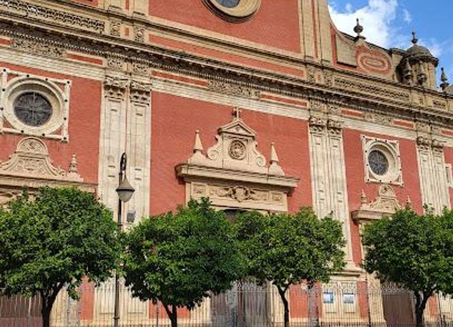 Explore the stunning Baroque beauty of Iglesia Colegial del Divino Salvador, a historical gem in the heart of Seville's vibrant Casco Antiguo.