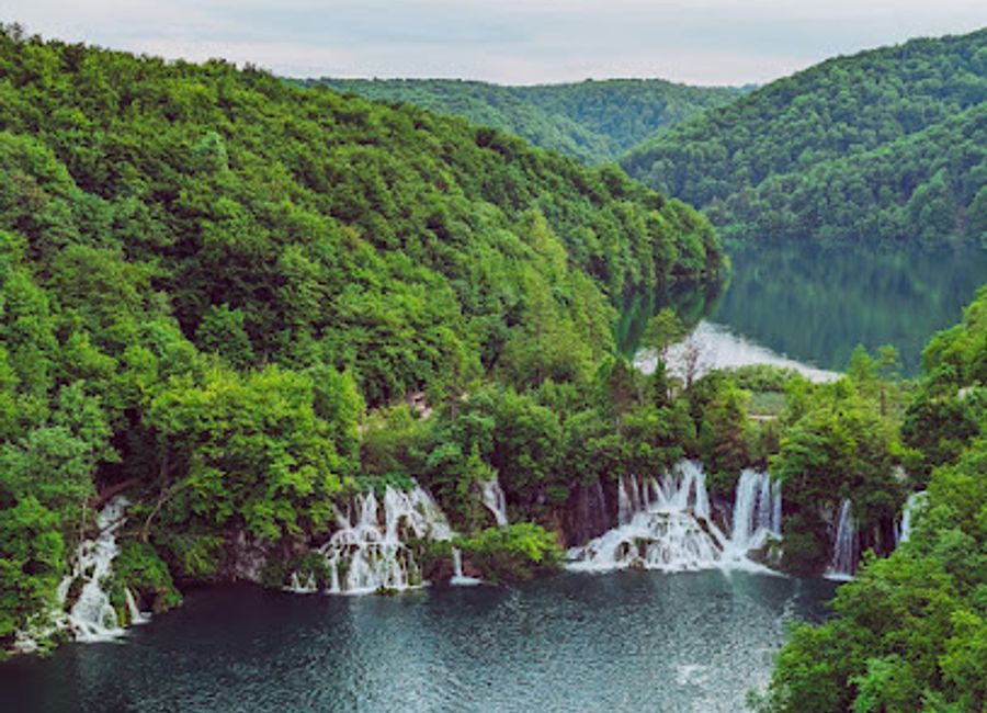 Discover the serene beauty of Plitvice Lakes at Yeti Cabin, your perfect retreat for adventure and relaxation in Croatia's natural wonderland.