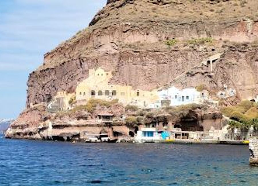 Explore the breathtaking Santorini Old Harbor, a picturesque marina surrounded by stunning views and vibrant local culture, perfect for travelers seeking adventure.