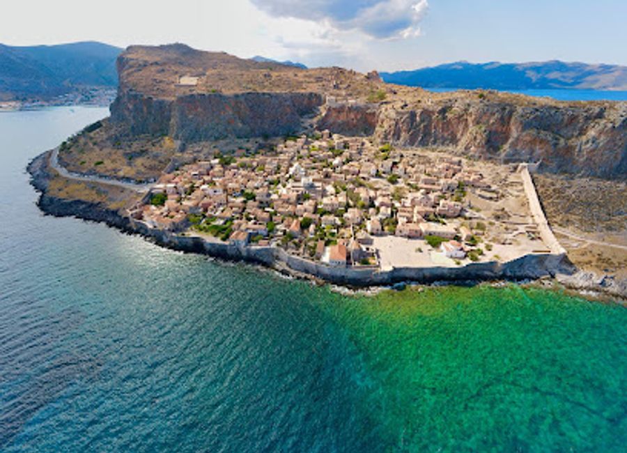 Discover the enchanting Chryssafitissa Square in Monemvasia, where stunning views, rich history, and vibrant local culture come together.