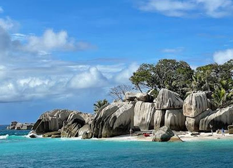 Explore the serene beauty and vibrant marine life of Cocos Island, Seychelles – a tropical paradise like no other.