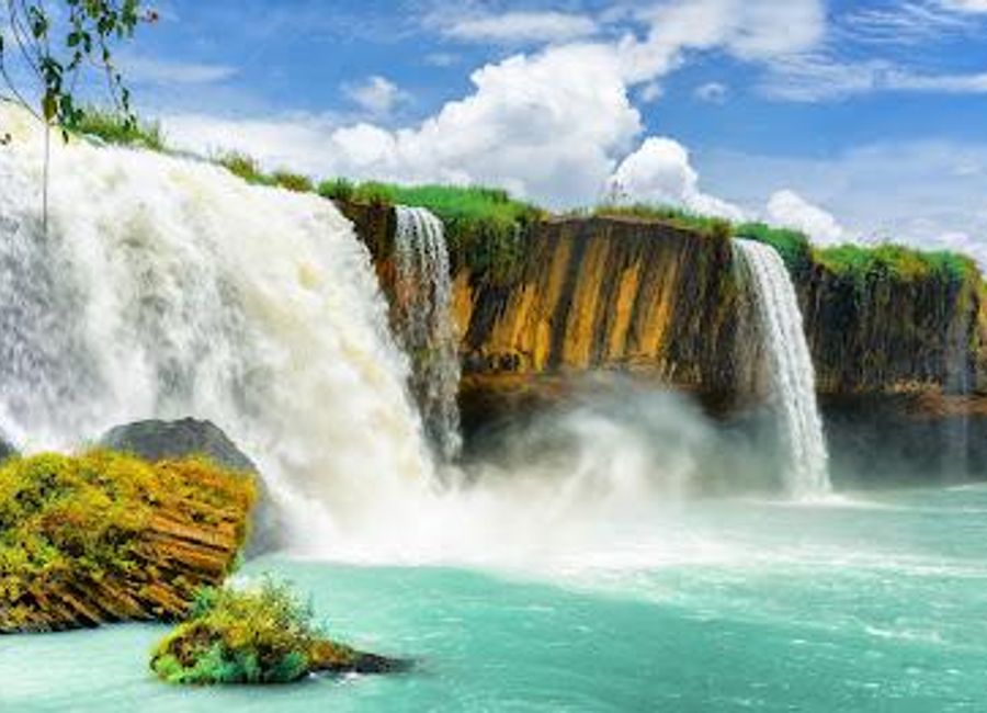 Experience the breathtaking beauty of Dray Nur Waterfall, a stunning natural gem in Dak Lak, Vietnam, perfect for adventure and relaxation.