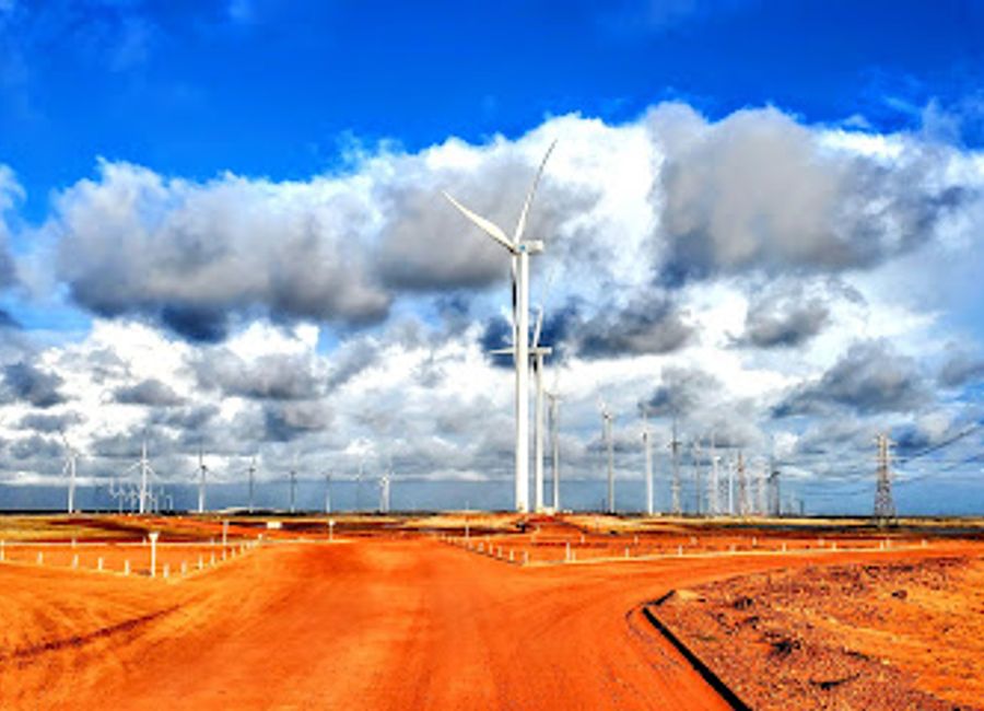 Discover the beauty of sustainable energy at Parque Eólico Caburé, where stunning landscapes meet innovative wind power technology.