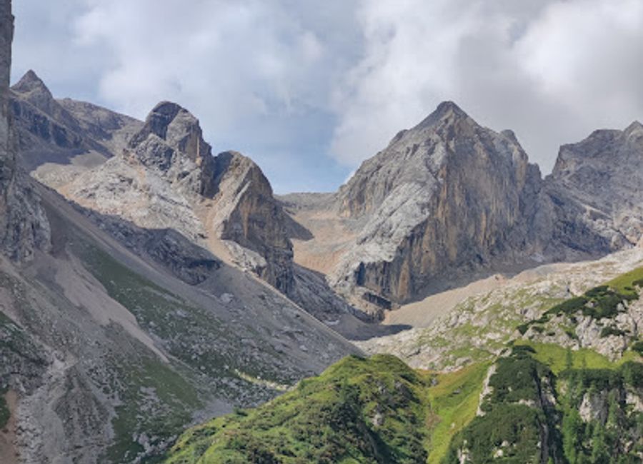 Explore Passo Ombretta, a stunning mountain pass in the Dolomites, perfect for hiking, cycling, and experiencing the beauty of Trentino's nature.