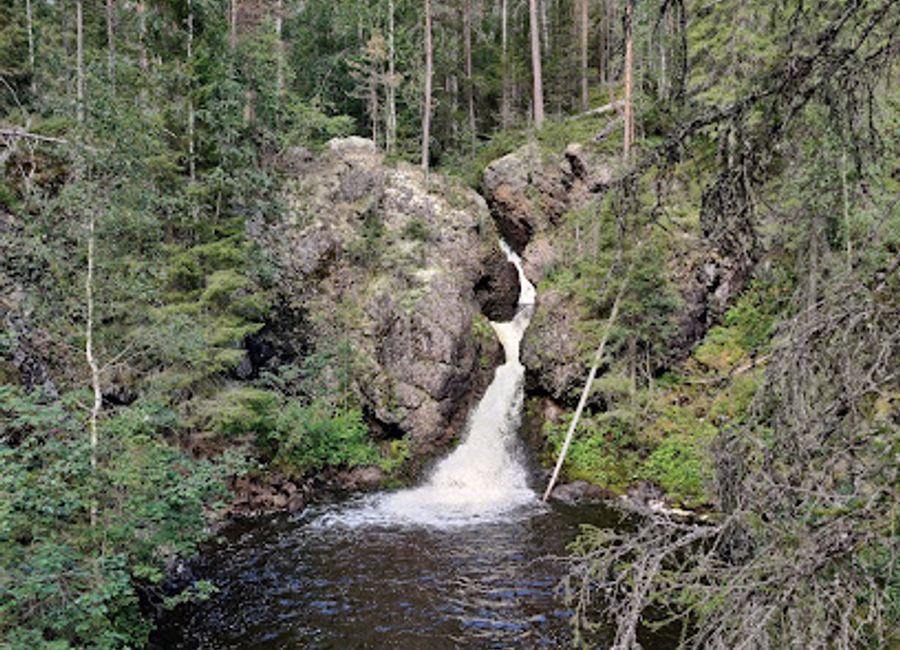 Experience the breathtaking Putaanköngäs Waterfall in Kuusamo, Finland, where nature's beauty and tranquility await every visitor.
