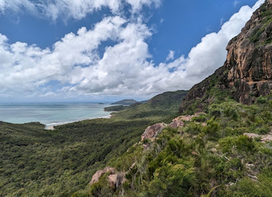Hike to Nina Peak on Hinchinbrook Island for unparalleled views of the Great Barrier Reef and rugged wilderness. A challenging climb with rewarding panoramas.