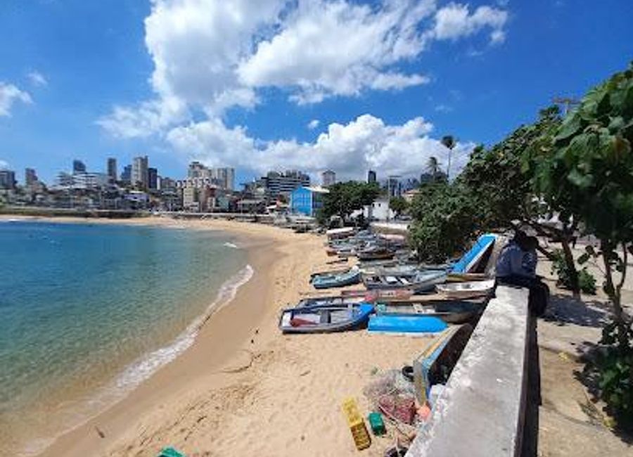 Experience the vibrant culture and stunning beauty of Praia do Rio Vermelho, a must-visit beach in Salvador, Bahia, perfect for relaxation and adventure.