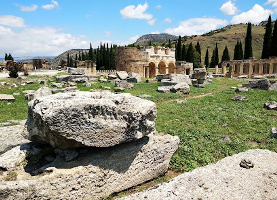 Explore the ancient beauty of Temple Nymphaeum in Pamukkale, a historical landmark showcasing Roman architecture and stunning natural landscapes.