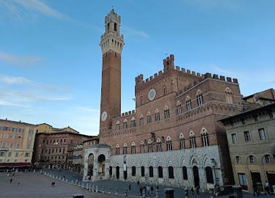 Explore the iconic Piazza del Campo in Siena, a historic square renowned for its stunning architecture and vibrant atmosphere, perfect for tourists seeking culture.