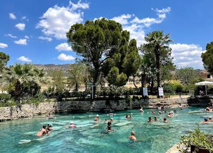 Experience the healing waters and stunning vistas of the Cleopatra Antique Pools in Pamukkale, a natural wonder steeped in history and beauty.