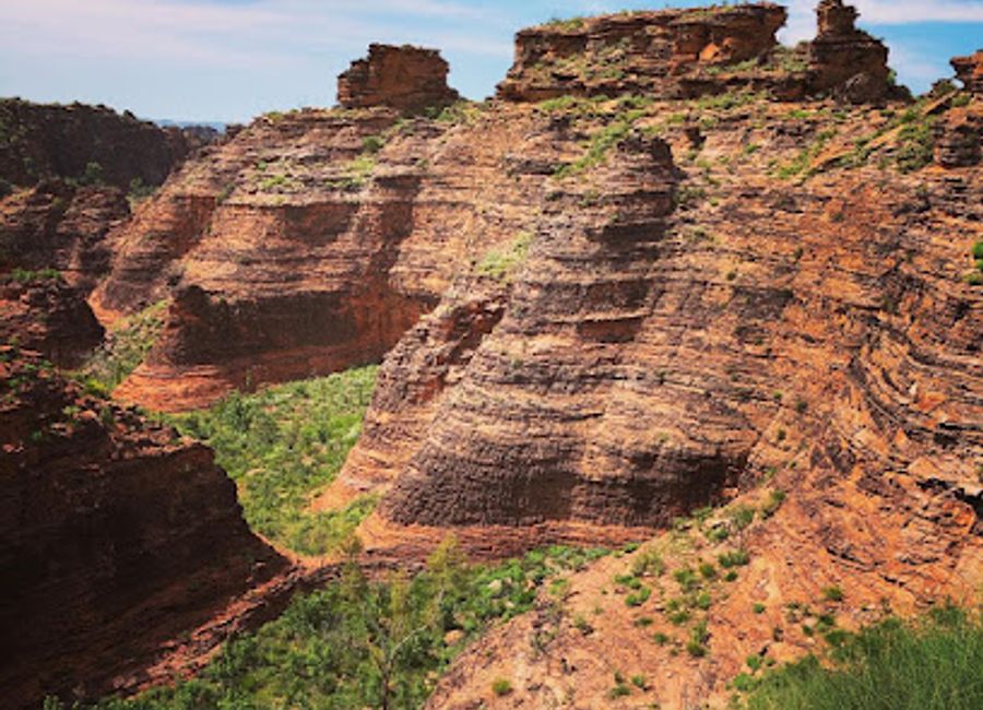 Explore ancient rock formations and Aboriginal culture at Mirima National Park, Kununurra's 'Mini-Bungles', offering stunning views and walking trails.