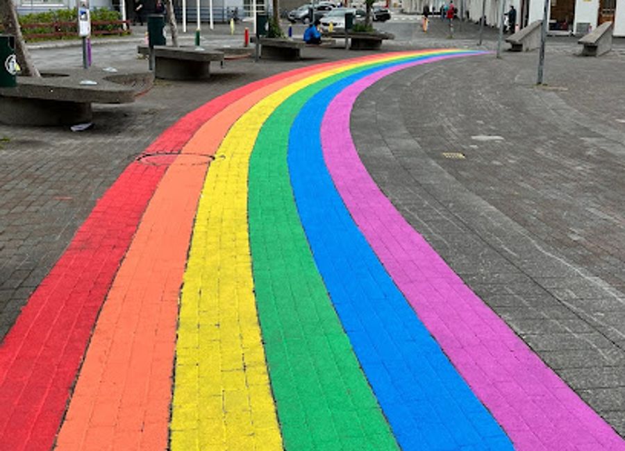 Discover the enchanting Rainbow Path in Ísafjörður, a vibrant tourist attraction showcasing the stunning natural beauty and culture of Iceland.