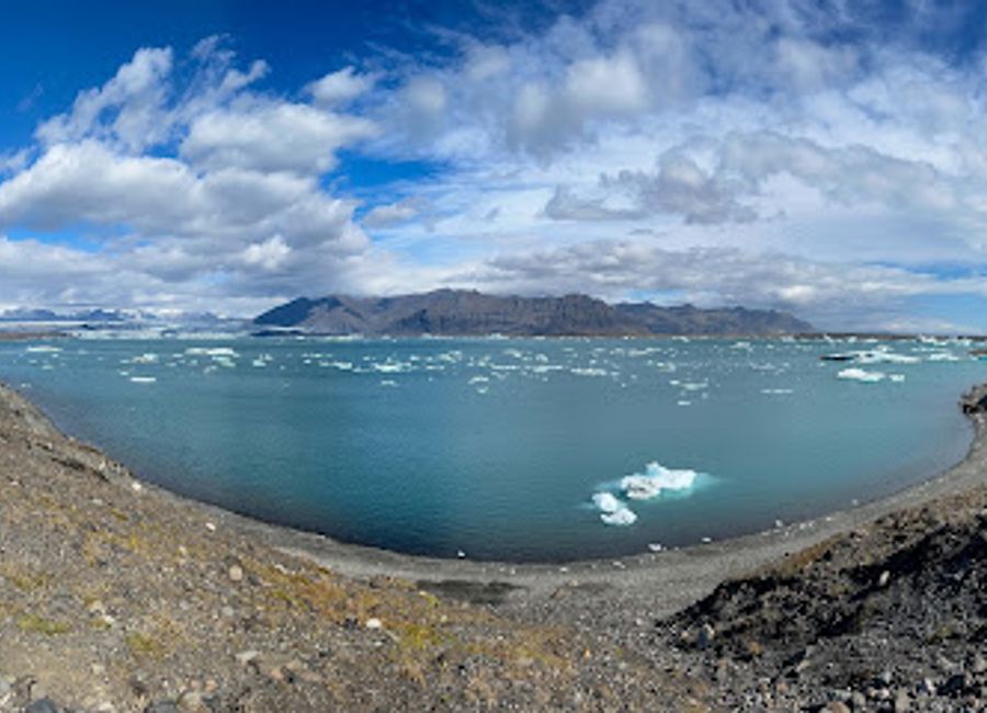 Experience the stunning beauty of Iceland at Jökulsárlón Viewpoint, where icebergs meet the glacial lagoon for breathtaking views.