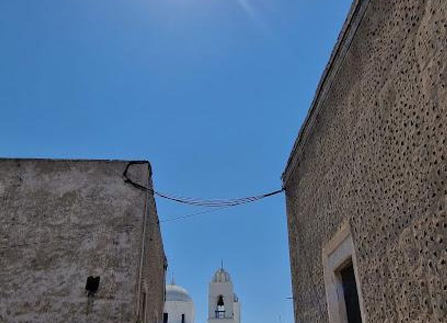 Experience the breathtaking views of iconic churches and landscapes at Megalochori Churches Viewpoint, a serene spot in beautiful Santorini.