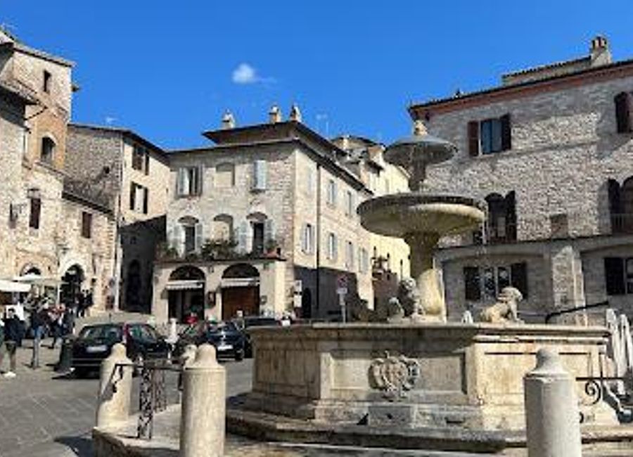 Experience the charm of Assisi at Piazza del Comune, a historic square surrounded by stunning architecture and vibrant local culture.