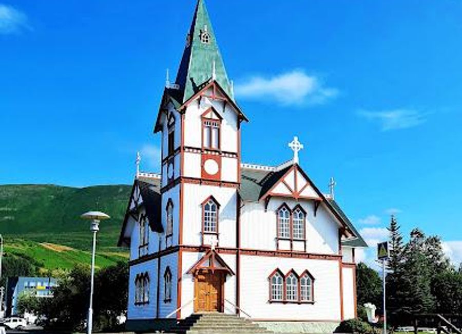 Explore the Húsavík Wooden Church, a stunning example of Icelandic craftsmanship nestled in the charming coastal town of Húsavík.