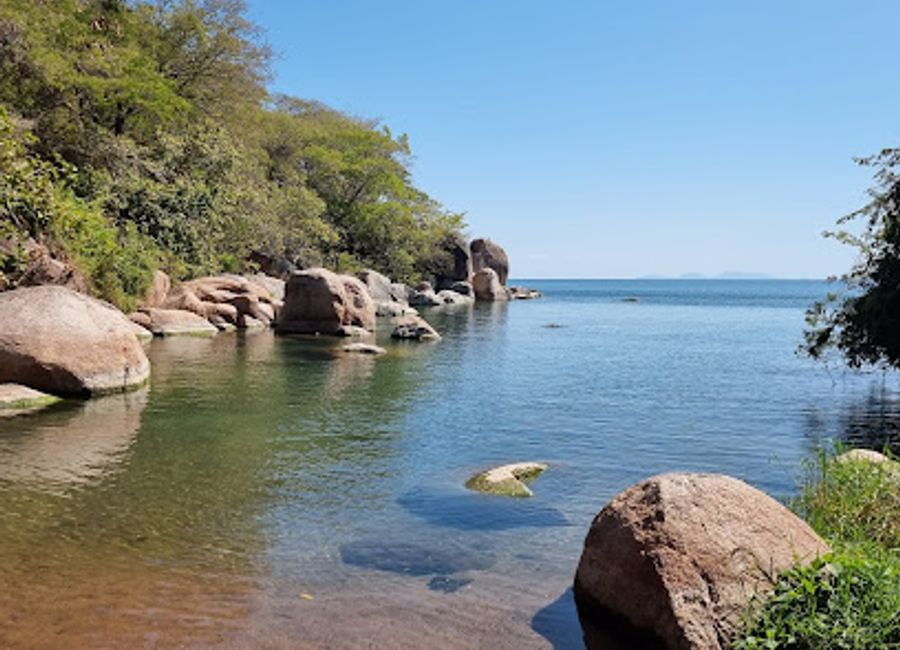 Explore the crystal-clear waters and vibrant wildlife of Lake Malawi National Park, a must-visit destination for nature lovers and adventure seekers in Malawi.