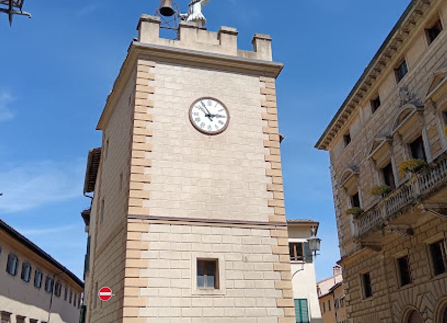 Discover the iconic Pulcinella Tower in Montepulciano, a stunning landmark offering breathtaking views and a glimpse into Tuscany's rich history.
