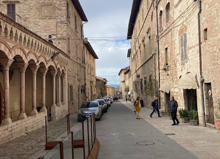 Explore the captivating Portico of Monte Frumentario in Assisi, a historical landmark that offers a glimpse into the town's rich heritage and stunning architecture.