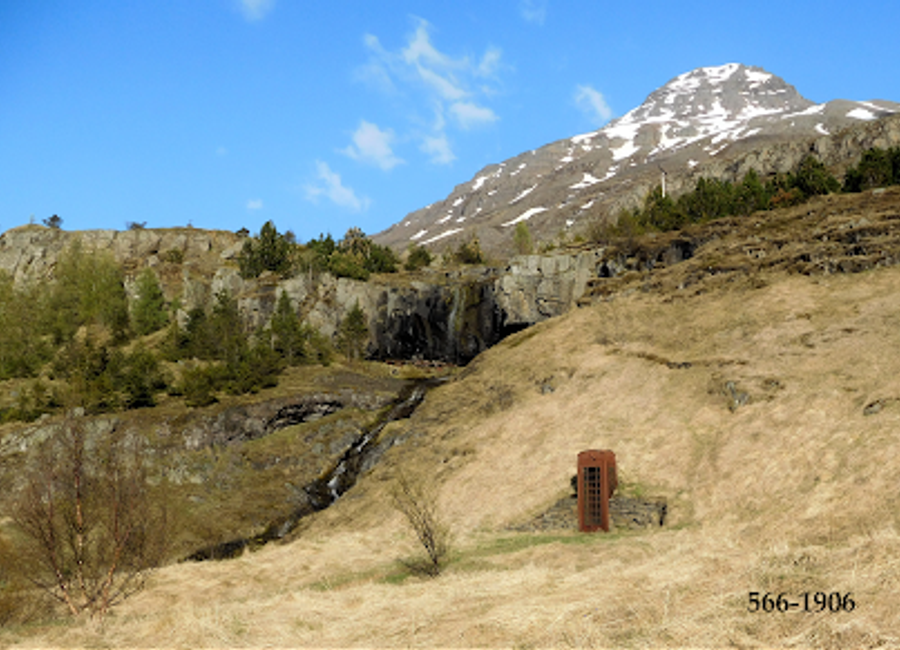 Explore the Sculpture of a telephone booth in Seydisfjordur, Iceland, a unique blend of art and local culture amidst stunning landscapes.