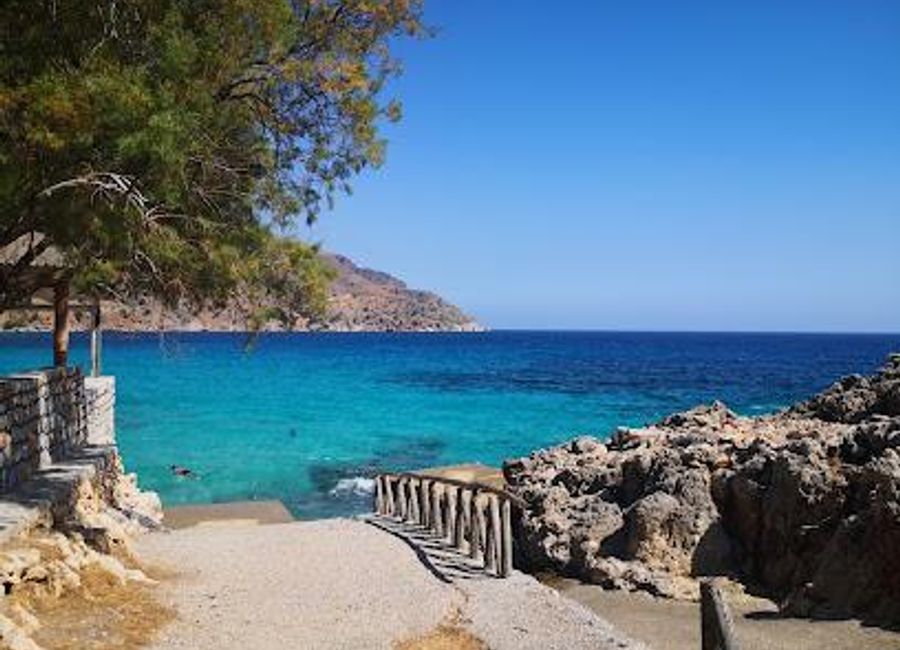 Explore Omprogialos, a stunning beach in Vamos, Crete, where golden sands meet crystal-clear waters for the ultimate relaxation and adventure.