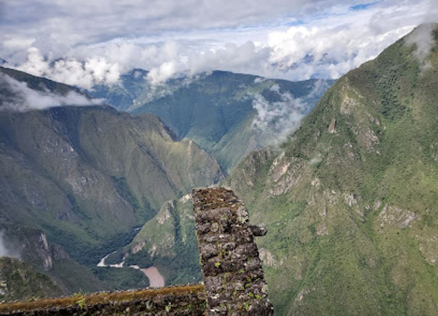 Experience breathtaking views and rich history at Huayna Picchu, the iconic mountain overlooking Machu Picchu in Peru's stunning Andes.