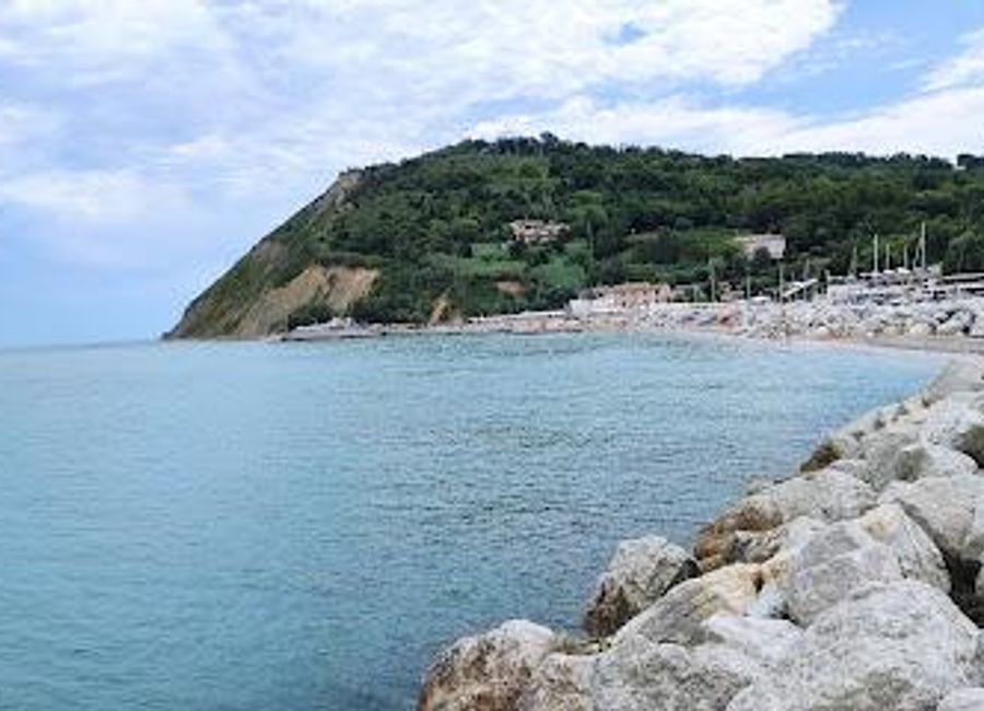 Explore the serene beauty of Baia di Vallugola, a hidden gem on Italy's Adriatic coast, perfect for relaxation and outdoor adventures.