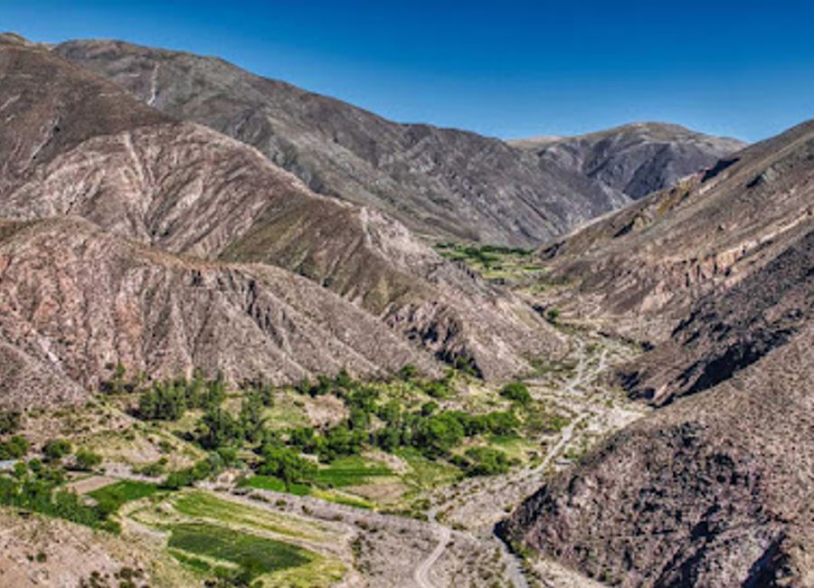 Experience breathtaking panoramic views of Jujuy's stunning landscapes from Mirador de la Piedra Sola, a must-visit viewpoint along RN52.