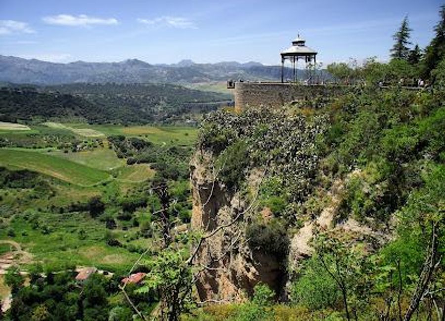 Explore the stunning Mirador de Ronda, where breathtaking views of cliffs, valleys, and the iconic Puente Nuevo await every traveler.