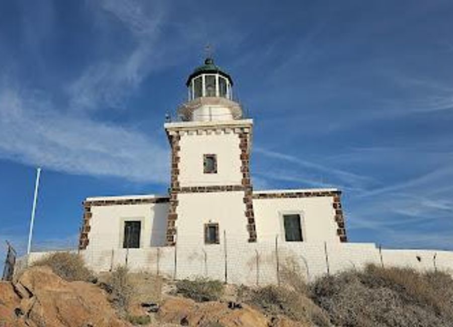 Discover the historic Akrotiri Lighthouse in Santorini, where stunning views meet rich maritime heritage in a serene coastal setting.