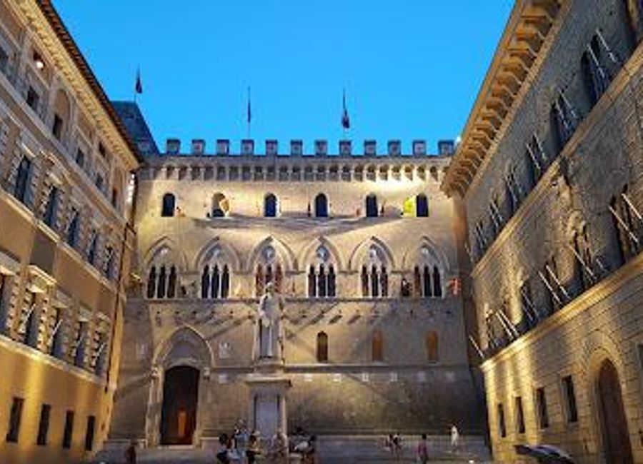 Experience the historical splendor of Palazzo Salimbeni, a Gothic architectural masterpiece in the heart of Siena, Italy.