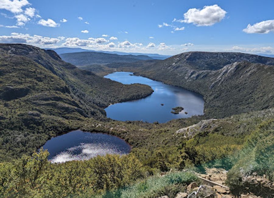 Hike the challenging Face Track for stunning views of Cradle Mountain's peaks and rugged alpine scenery in Tasmania's iconic national park.