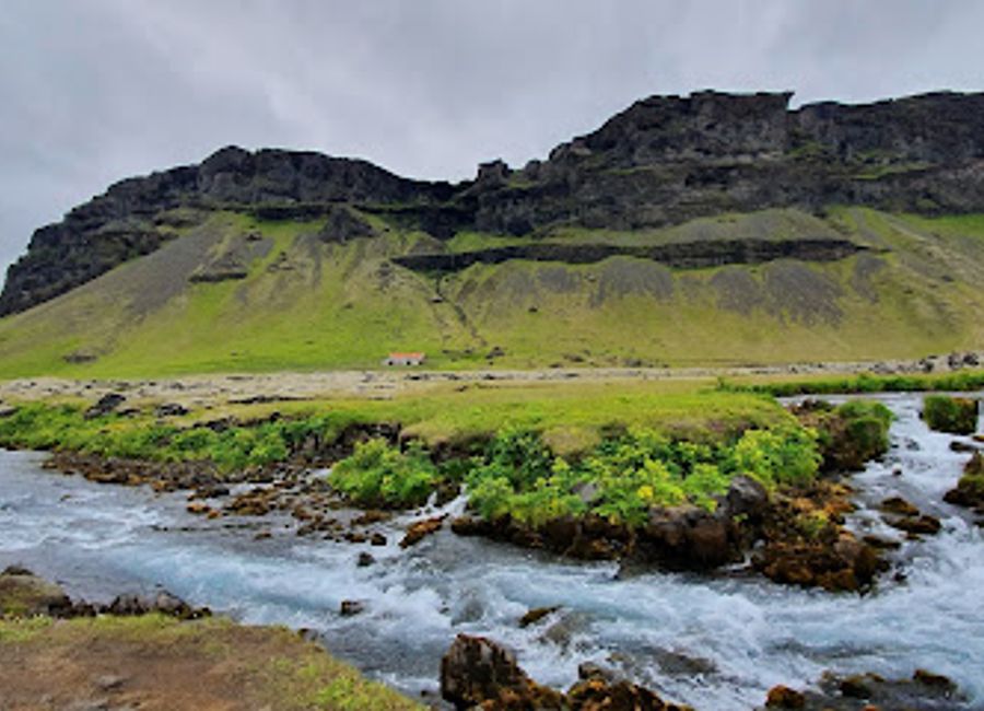 Experience the breathtaking beauty of Systrafoss Waterfall, a serene hiking area in Iceland perfect for nature lovers and photographers.