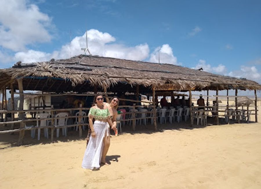 Discover the serene beauty of Praia do Barro Vermelho in Paulino Neves, Maranhão, with its striking red cliffs, tranquil waters, and abundant wildlife.