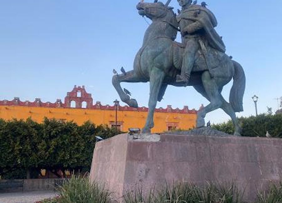 Explore the tranquil beauty of Plaza de la Soledad, a picturesque garden in San Miguel de Allende, where culture and nature intertwine.