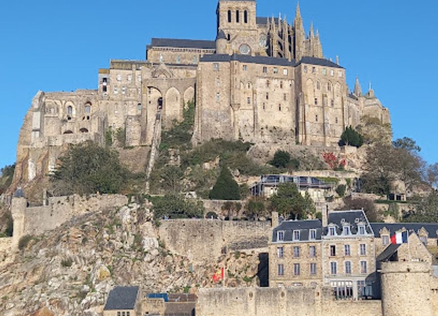 Experience the breathtaking views and serene landscapes at Roche Torin, a stunning tourist attraction in Courtils, perfect for nature lovers.