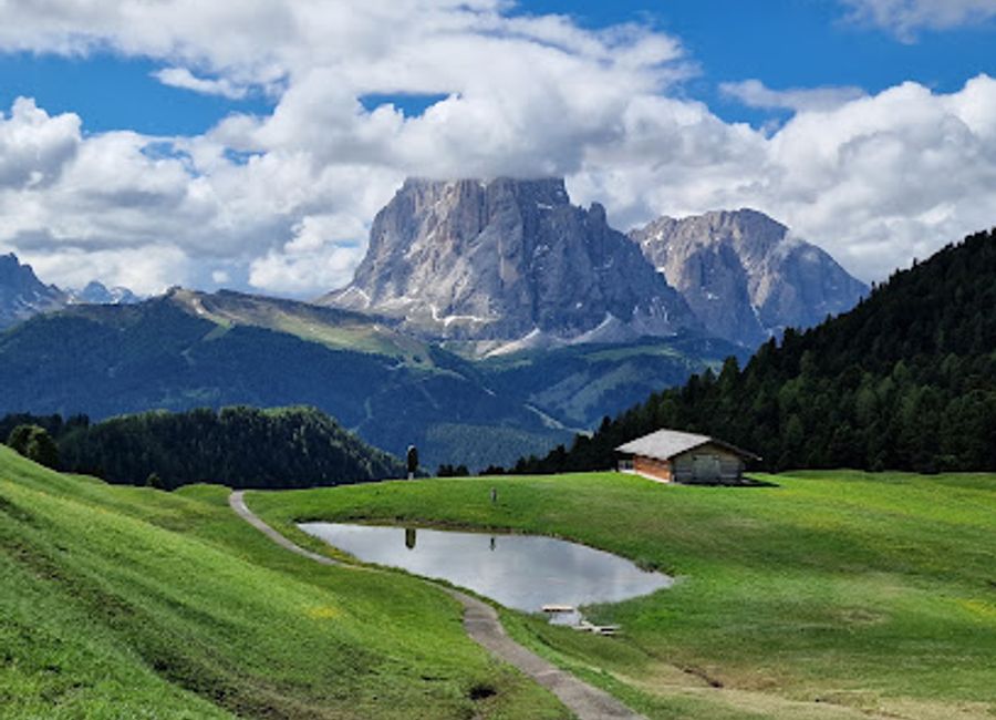 Experience the breathtaking views and outdoor adventures at Seceda Ridgeline, a stunning tourist attraction in the Dolomites of South Tyrol, Italy.