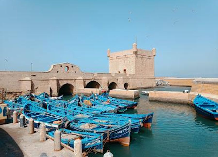 Explore the vibrant Port of Essaouira, where rich history meets stunning coastal views and local flavors await every traveler.