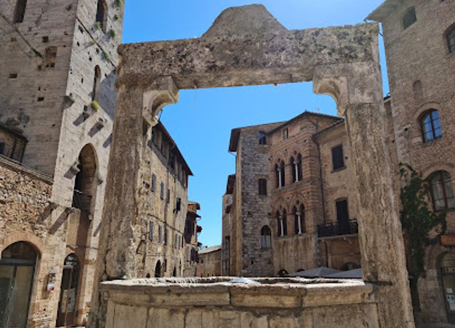 Explore Casa Santa Fina in San Gimignano, a historical landmark dedicated to the saint known for her miraculous life and serene beauty.