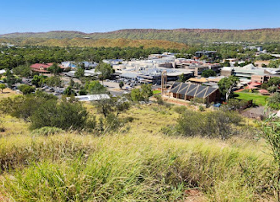 Escape to Trevor Reid Park in Alice Springs: a green sanctuary with playgrounds, walking paths, and picnic spots for relaxation and recreation.