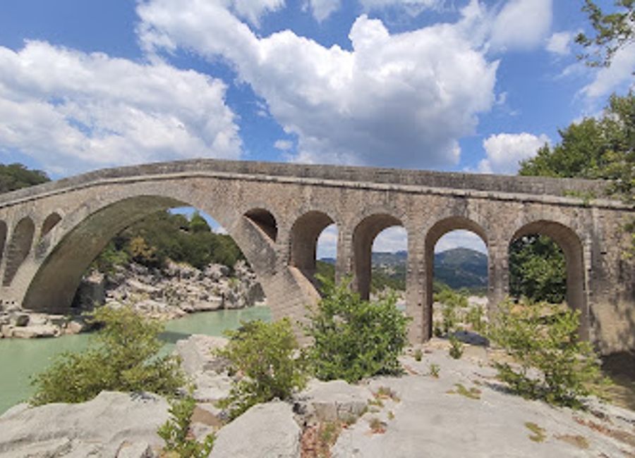 Explore the historic Temblas Ancient Stone Bridge in Agrafa, Greece, where stunning views meet rich cultural heritage in a picturesque setting.