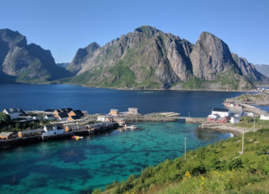 Discover Olenilsøya Kystfort, a historical gem in Reine, Norway, offering stunning views and a deep dive into coastal history amidst breathtaking landscapes.