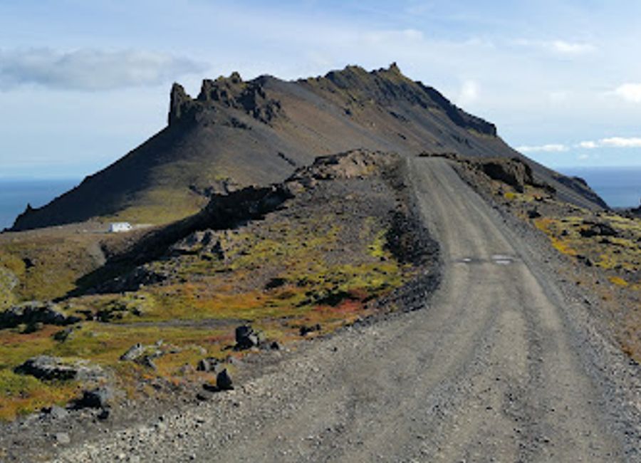 Explore Sönghellir Cave, Iceland's captivating natural wonder, where history and breathtaking geology come together in an enchanting setting.