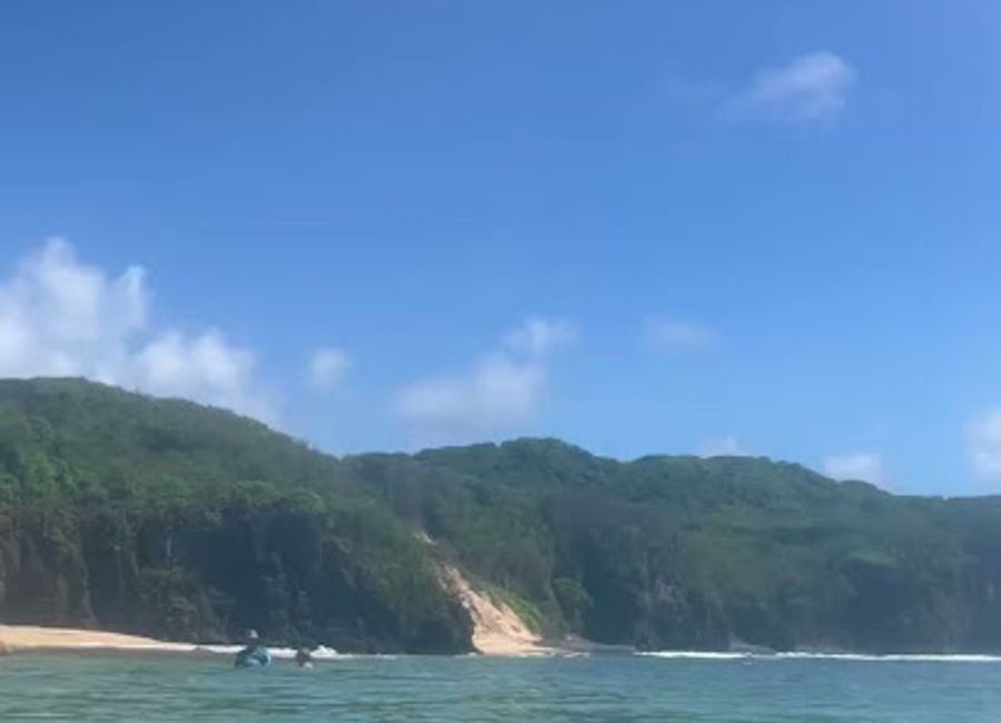 Discover Baía de Santo Antônio: Where turquoise waters meet lush landscapes for a serene escape in Brazil's coastal paradise.