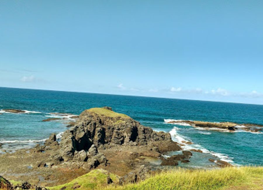 Discover breathtaking coastal views and unique rock formations at Mirante Buraco da Raquel, a legendary spot on the paradise island of Fernando de Noronha.